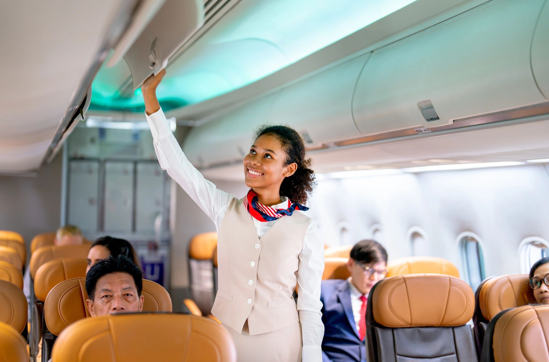 Cabin crew service moment inside an aircraft