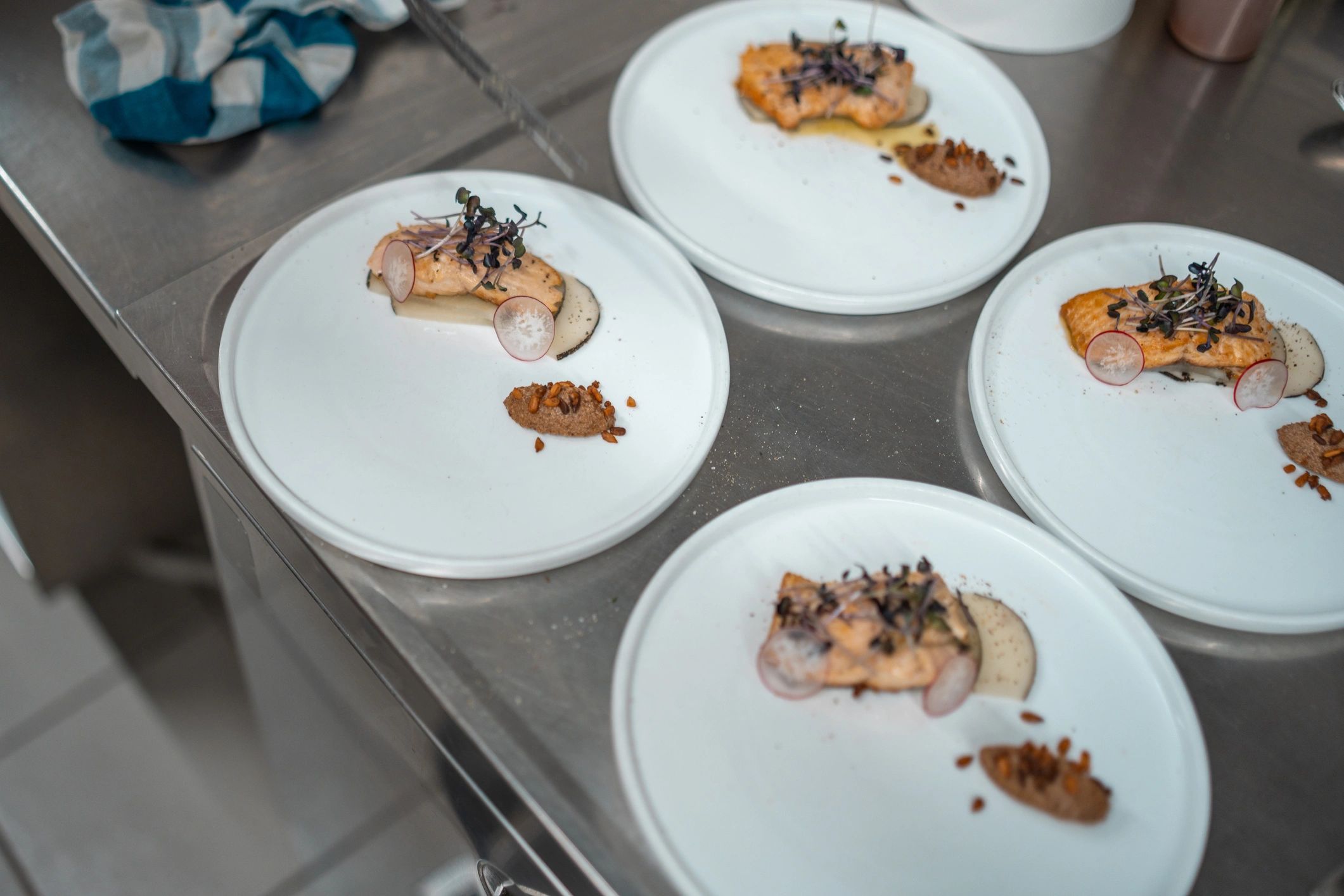 Premium plated cuisine prepared for aviation hospitality service