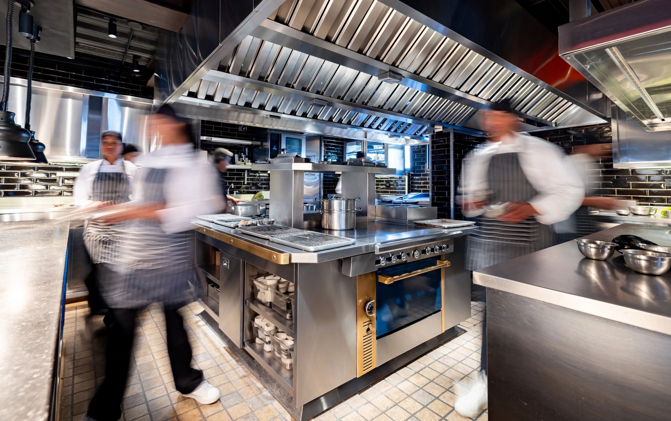 Professional catering team working in a premium kitchen
